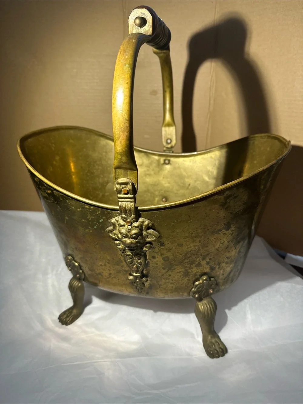 Solid copper and brass coal handle lions head footed made in Ireland 12”x13”x9”